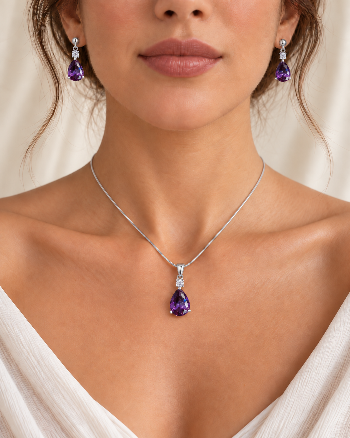 Schmuckset aus 925er und 950er Silber mit violetten Zirkonia